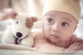 Baby With Toy Dog