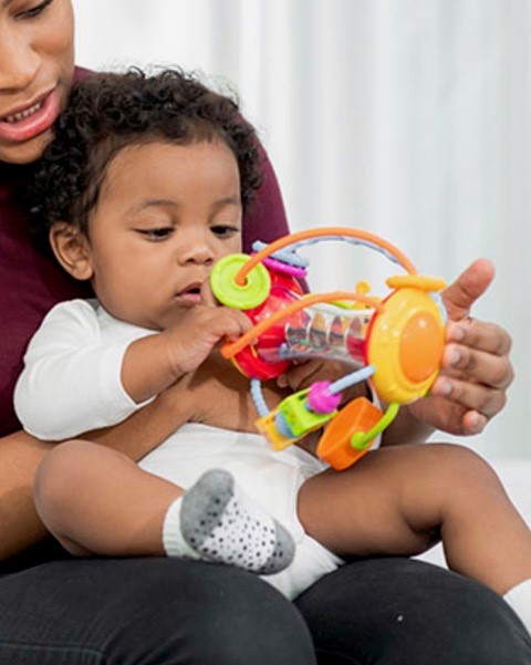 Child playing with toy