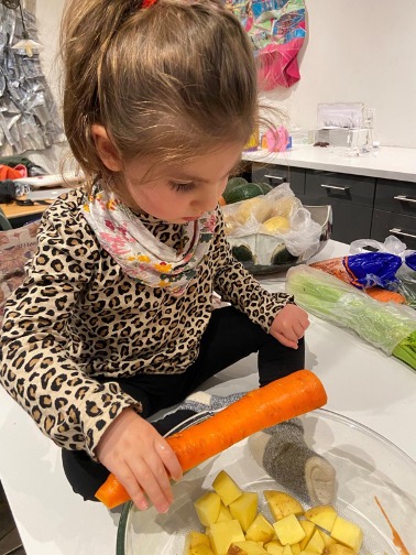 Girl with Carrots and cooking