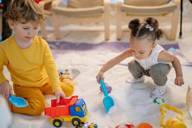 children playing in sand