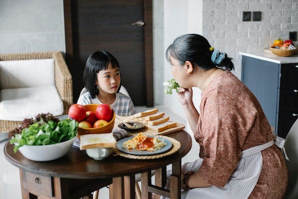 Women and Child at Table